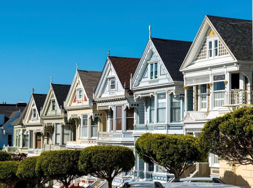 Row of older Victorian houses typical of Bay Area housing stock built before 1978